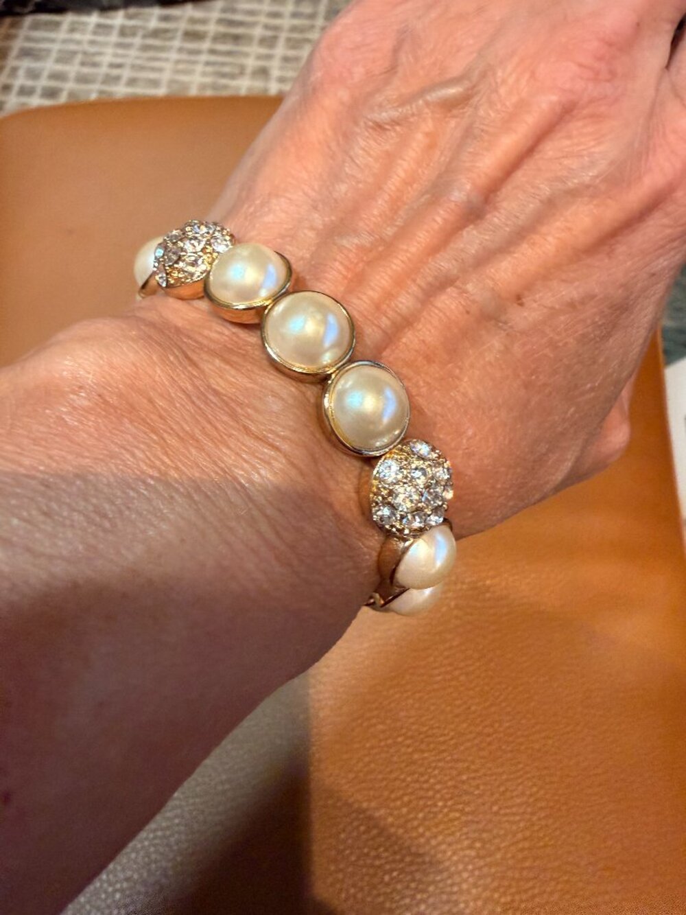 Faux Pearl and Rhinestone Bracelet 12mm Bracelet is stretchy. No defects